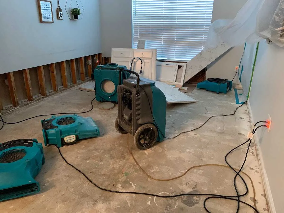 Dehumidifier in flood-cut room for Water Extraction & Removal in Coralville
